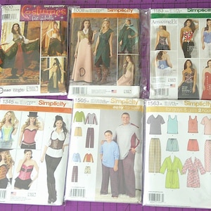 May include: Six different sewing patterns for clothing, packaged in clear plastic bags. The patterns are from Simplicity and include costumes for adults, easy-to-sew clothing, and patterns for guys and gals. The patterns include a variety of styles, including a corset, a dress, a shirt, and pants.