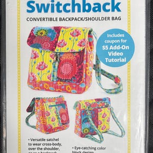 May include: A package featuring a colorful Switchback convertible backpack/shoulder bag. The bag has a floral design with yellow, pink, and red hues. The package includes a coupon for a video tutorial and highlights features like a recessed zipper and multiple pockets.
