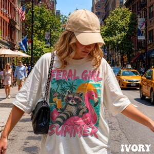 Feral Girl Summer Retro Raccoon Shirt Funny Trash Panda Beach Vacation Tee Flamingo Pool Float Tropical Sunset Apparel