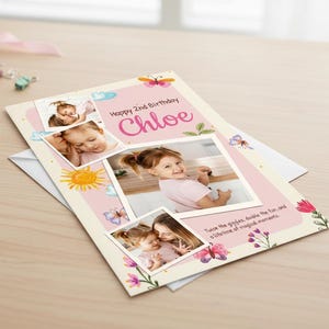May include: A personalized birthday card with photos of a young girl named Chloe. The card features a pink and white design with floral and butterfly illustrations, and the text "Happy 2nd Birthday Chloe".