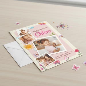 May include: A personalized birthday card with photos, butterflies, and flowers. The card says "Happy 2nd Birthday Chloe" in pink script. An envelope and confetti are next to the card.