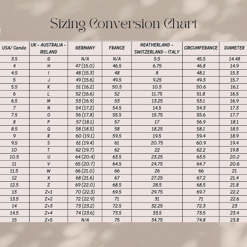Puede incluir: Una tabla de conversi&oacute;n de tallas titulada Sizing Conversion Chart con texto negro sobre fondo claro. La tabla enumera tallas de anillos para EE. UU./Canad&aacute;, Reino Unido/Australia/Irlanda, Alemania, Francia, Pa&iacute;ses Bajos/Suiza/Italia y medidas en mil&iacute;metros.