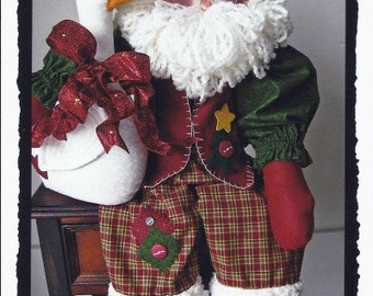 May include: A handmade Christmas gnome doll wearing a red and green plaid outfit, a white fur trim, and a green hat with a yellow star. The gnome is holding a white goose with a red bow.