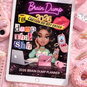 May include: A digital planner on a tablet with the text "Brain Dump 2026". The planner features a cartoon illustration of a woman, a laptop, and a flip phone. The background is pink with various accessories.