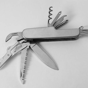 May include: A silver multi-tool pocket knife with a variety of blades and tools, including a saw, a bottle opener, a screwdriver, and a pair of scissors.