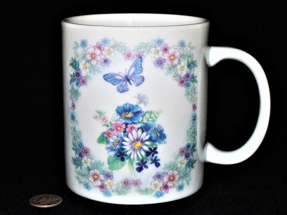Pastel Blue Butterfly and Floral 12 Ounce Mug