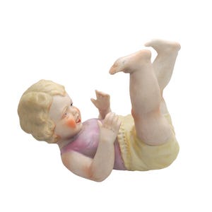 Vintage Bisque Porcelain Piano Baby