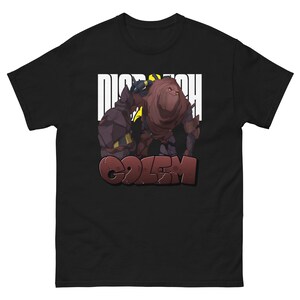 May include: Black t-shirt featuring a graphic of two stylized figures with the word "DISPATCH" above and "GOLEM" in a graffiti-style font. The figures are in shades of brown, black, and yellow.