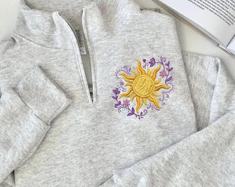 太陽の刺繍入りラプンツェルスウェットシャツ、塔の上のラプンツェルをイメージしたクォータージップ、パスカルサンプルオーバー、ディズニーをイメージした花柄セーター