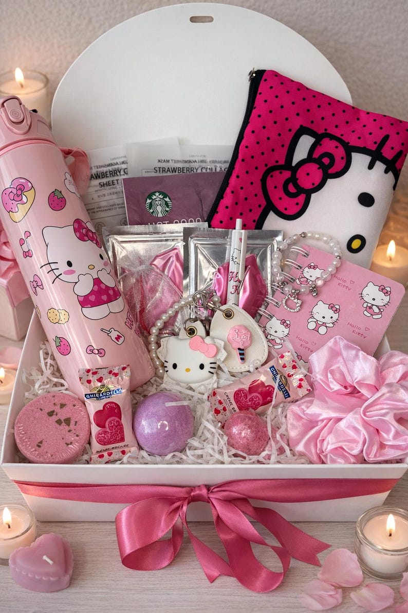 May include: A gift box containing Hello Kitty merchandise. It features a pink water bottle, a pink polka dot pouch, a bracelet, a keychain, a notepad, sweets, bath bombs, and a pink satin scrunchie. The box is tied with a pink ribbon.
