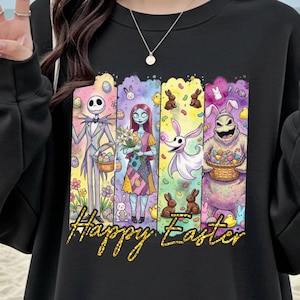 Könnte beinhalten: Schwarzes Sweatshirt mit einem farbenfrohen Aufdruck mit Figuren und dem Text "Happy Easter". Der Aufdruck zeigt Jack Skellington, Sally, Zero und Oogie Boogie mit Ostermotiven.