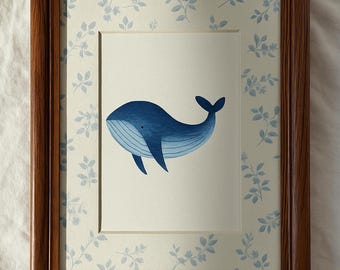 May include: Framed art print of a blue whale illustration. The whale is in shades of blue on a white background. The frame is dark wood, and the mount has a blue and white floral pattern. The artwork is suitable for a child's room.