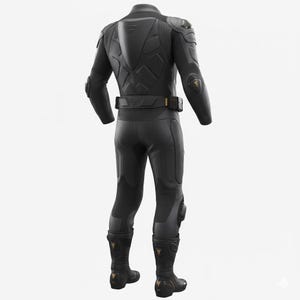 May include: Black motorcycle racing suit with protective padding on the shoulders, elbows, knees, and boots. The suit has a belt with a gold buckle and gold accents on the boots. The suit is designed for safety and performance.
