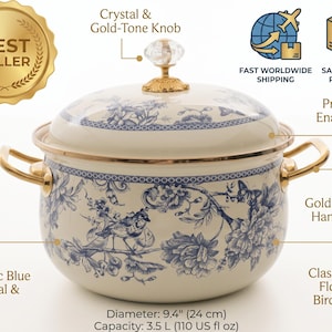 May include: A cream-coloured enamel pot featuring a blue floral and bird motif, gold-tone handles, and a crystal and gold-tone knob on the lid. The pot has a diameter of 24 cm and a capacity of 3.5 litres.