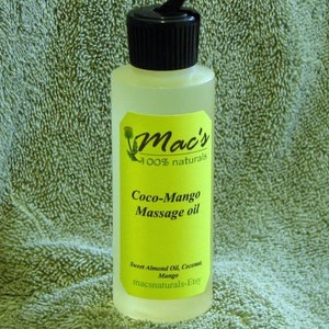 May include: A clear glass bottle with a black flip top lid filled with yellow liquid. The bottle has a yellow label with the text "Mac's 100% naturals Coco-Mango Massage oil Sweet Almond Oil, Coconut, Mango macsnaturals-Etsy".