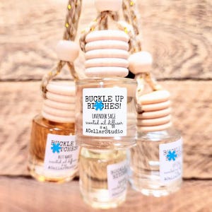 BUCKLE UP BITCHES! - Car Air Freshener- Car Oil Diffuser - For Scented Oil Diffusers - Funny New Car Gift - 55+ Scents! 1-4oz Refill Bottles