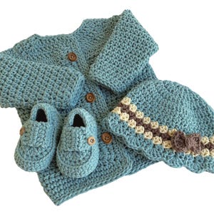 Handmade Baby Girl Sweater Set: Crocheted Cardigan, Hat & Booties 4.9 (213) By LisaCorinneHandmade Made by LisaCorinneHandmade Shop owned by Corinne 15 years on Etsy