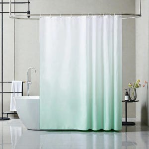 Puede incluir: Un juego de tres tazas de cerámica con un acabado mate moteado. Las tazas son de color crema, gris claro y gris oscuro. Cada taza tiene un diseño simple y minimalista.