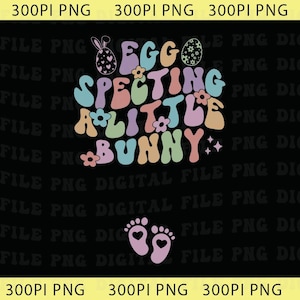 May include: A colorful graphic on a black background with the text "Eggspecting a Little Bunny." The design includes a bunny, eggs, flowers, and baby footprints. The text is in a retro font with pastel colors.