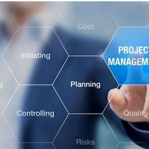 May include: A person's finger pointing at a blue hexagon labeled "PROJECT MANAGEMENT." The image is a visual representation of project management concepts, with other hexagons displaying terms like "Planning" and "Quality."