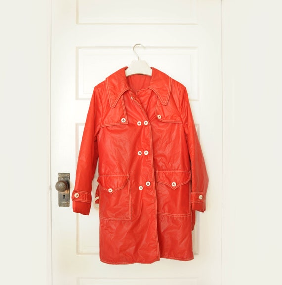 red trench coat with hood