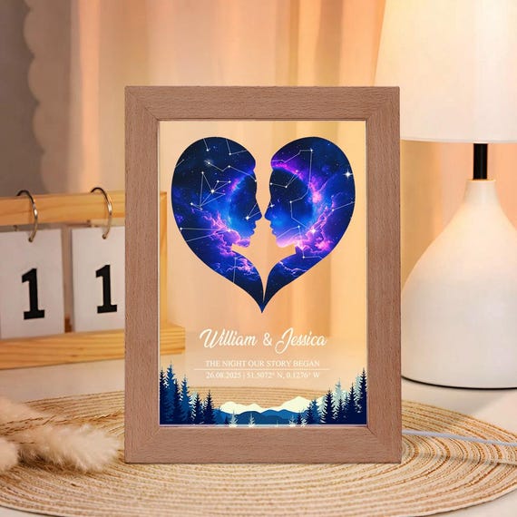 A star map that doubles as a glowing night lamp inside a beech wood photo frame — three gifts in one, genuinely tactile and romantic.