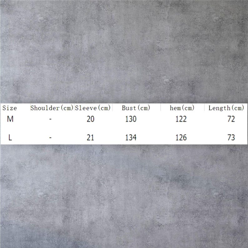 May include: A size chart table for clothing with columns for Size, Shoulder (cm), Sleeve (cm), Bust (cm), hem (cm), and Length (cm). The table lists size M with a 20 cm sleeve, 130 cm bust, 122 cm hem, and 72 cm length, and size L with a 21 cm sleeve, 134 cm bust, 126 cm hem, and 73 cm length.
