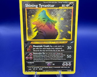 1.ª edición de Tyranitar Brillante Proxy Neo Destiny