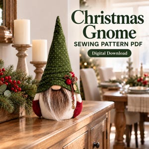 May include: A fabric gnome figurine with a tall green hat featuring white polka dots, a long brown beard, and red mittens. The text reads Christmas Gnome SEWING PATTERN PDF Digital Download. The gnome is decorated with small red berries.