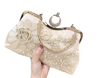 Elegante bolso de noche de satén con bordado de flores orientales, asa desmontable y cadena para el hombro.