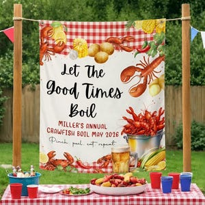 May include: A banner with the text "Let The Good Times Boil" and "MILLER'S ANNUAL CRAWFISH BOIL MAY 2026". The banner features illustrations of crawfish, corn, potatoes, and lemons. A table is set with food and drinks.