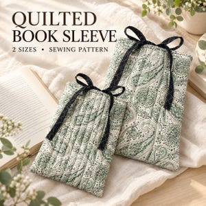 May include: Two quilted book sleeves in two sizes featuring a green and white paisley pattern with black ribbon ties. The text QUILTED BOOK SLEEVE 2 SIZES SEWING PATTERN is visible. These fabric covers are designed to protect books from damage.