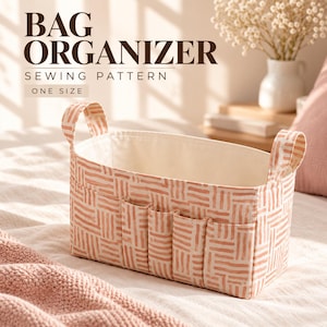 May include: A rectangular fabric bag organizer featuring a peach and white abstract dash pattern. The container has two upright handles and four exterior pockets along the front side. Text on the image reads BAG ORGANIZER SEWING PATTERN ONE SIZE.