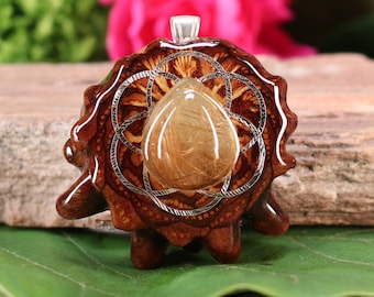 Pinecone Pendant with Glowing Rutilated Quartz and Silver Seed of Life (Medium) by Third Eye Pinecone