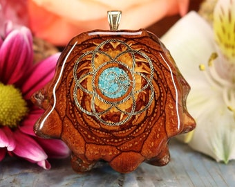 Pinecone Pendant with Crushed Turquoise (Glows) and Gold Seed of Life and Front Om (Medium) by Third Eye Pinecone