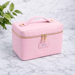 Caja de aseo de cuero rosa
