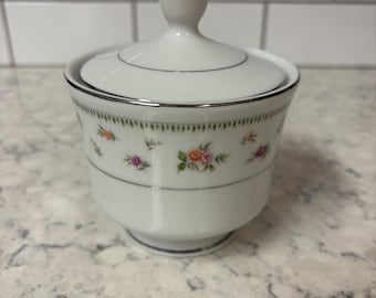 Vintage Abingdon White porcelain sugar bowl with floral pattern and silver trim.