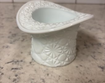 Vintage Fenton white milk glass top hat with buttons and bows pattern.