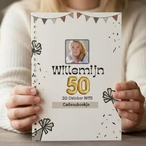 May include: A personalized birthday card with the name "Willemijn" and the number "50" in gold. The card includes a photo, decorative elements, and the date "22 Oktober 1975". The words "Cadeauboekje" are also visible.
