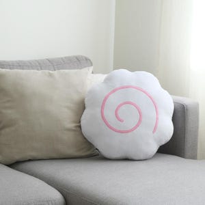 May include: A set of three ceramic mugs with a speckled, matte finish. The mugs are in shades of cream, light gray, and dark gray. Each mug has a simple, minimalist design, perfect for coffee or tea.