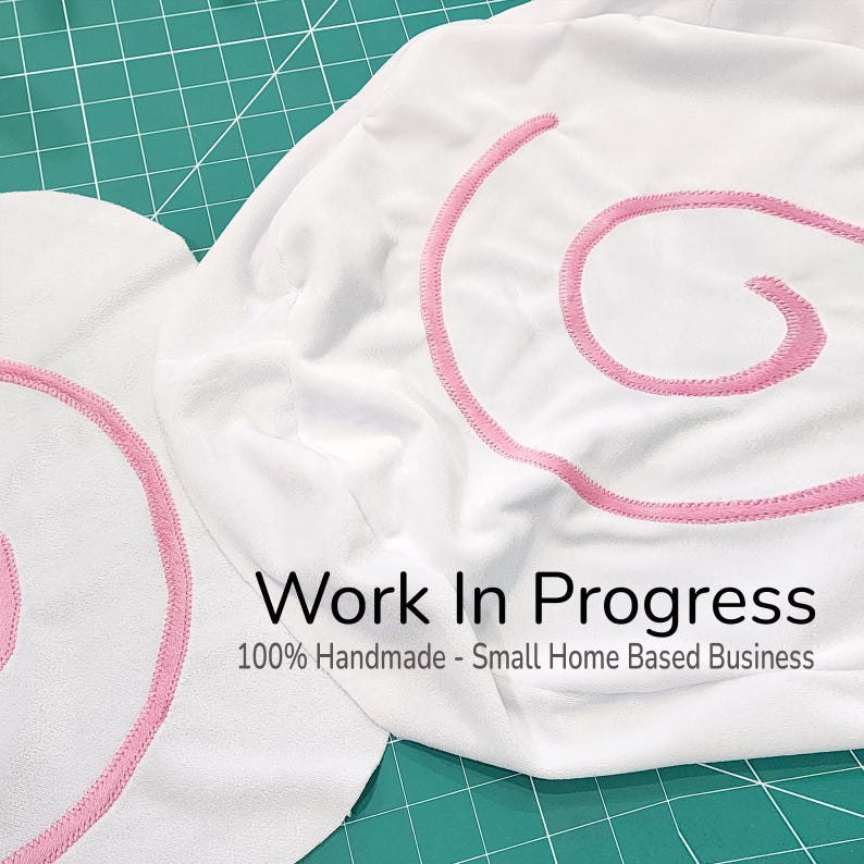 May include: A set of three ceramic mugs with a speckled, matte finish. The mugs are in shades of cream, light gray, and dark gray. Each mug has a simple, minimalist design, perfect for coffee or tea.