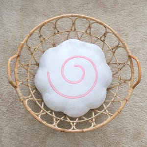 May include: A set of three ceramic mugs with a speckled, matte finish. The mugs are in shades of cream, light gray, and dark gray. Each mug has a simple, minimalist design, perfect for coffee or tea.