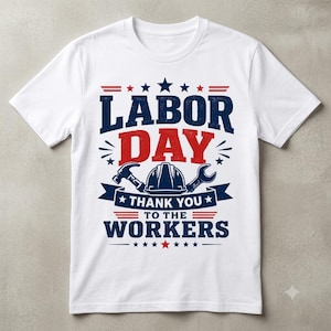 May include: A white short-sleeve t-shirt featuring a graphic with the text LABOR DAY THANK YOU TO THE WORKERS in blue and red. The design includes a central hard hat, a hammer, a wrench, and stars, all rendered in a distressed, patriotic style.