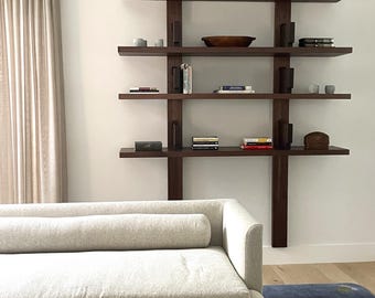 Custom 6 foot wide walnut Pierre Chapo bibliotheque style wall mounted bookcase shelves
