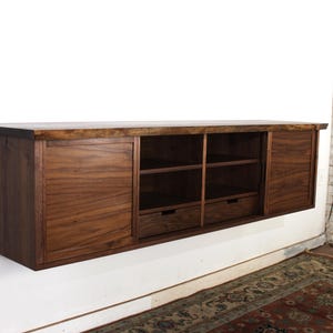 chinese dress ladies Amazon.com: WAMPAT White Dresser TV Stand, Wood Entertainment Center with  12 Drawers, 2-in-1 TV Console Table for 80 Inch TV, Long Dresser Chest of  Drawers for Living Room, Bedroom, Hallway : Home main image 1