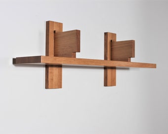Single cherry floating wall shelf in the style of Pierre Chapo Bibliotheque