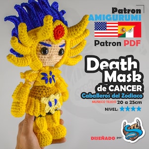 Puede incluir: Muñeco de ganchillo hecho a mano en amarillo y azul, con un diseño detallado. El muñeco mide aproximadamente 20 a 25 cm de alto. La imagen incluye el texto "Death Mask de CANCER" y "Caballeros del Zodiaco".