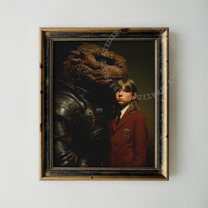 May include: A framed portrait featuring a person with shoulder-length hair wearing a red blazer and a dark tie, standing beside a large, textured, brown reptilian creature clad in dark, metallic armor. The artwork is encased in a dark wood frame.