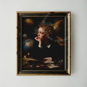 May include: A framed vintage print depicting a person with red hair in a thoughtful pose. The image includes a globe, celestial elements, and a desk with books and writing materials. The print is labeled "PURE PRINT ATELIER".