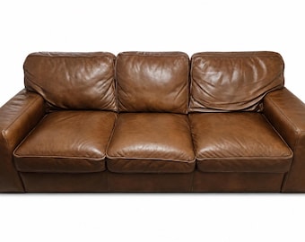 Sofá/sillón de piel Natuzzi marrón. El envío se cobra aparte.